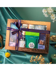 Assorted luxury chocolates, chocolate drink and baking mixes in medium celebration hamper
