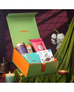 Selection of luxury chocolates and cookies in small celebration hamper
